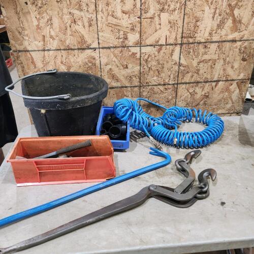 Rubber pail, air hose, various tools