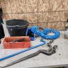 Rubber pail, air hose, various tools