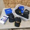 Urine cups, blood pressure tester, hats
