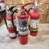 3 12" Charged fire extinguishers