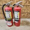 2 15" Charged fire extinguishers