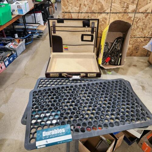 Empty briefcase, 16"x28" boot mats, tools