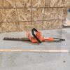 Electric hedge trimmer, yard stick