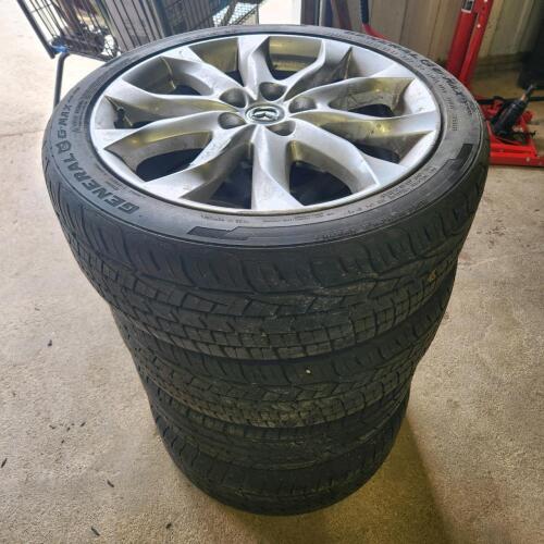 4 215/45R18 Mazda wheels, thread 80%