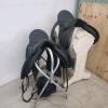 2 English saddles w stands