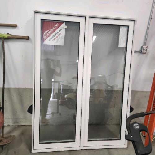 New opening vinyl window 66"H 49"W
