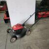 Running Honda self propelled mower