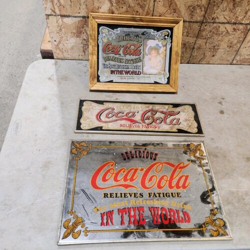 Coca-Cola mirror signs