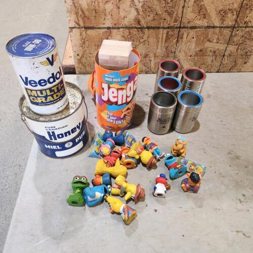Sesame street finger puppets, tins, etc.