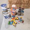 Sesame street finger puppets, tins, etc.