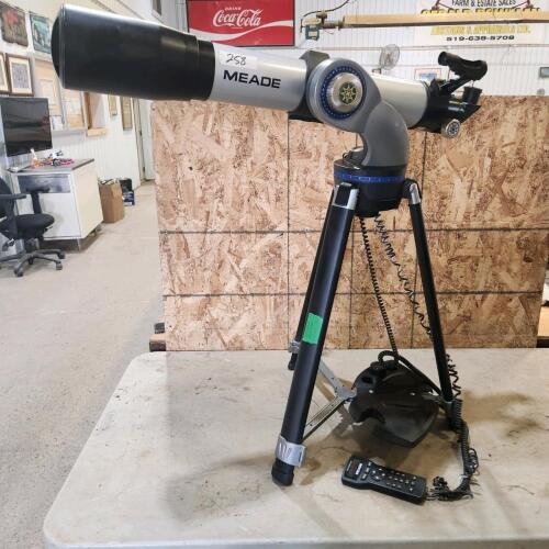Meade telescope on tripod