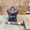 Shop vac, hose inside