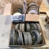 Various sized lawnmower wheels, etc.