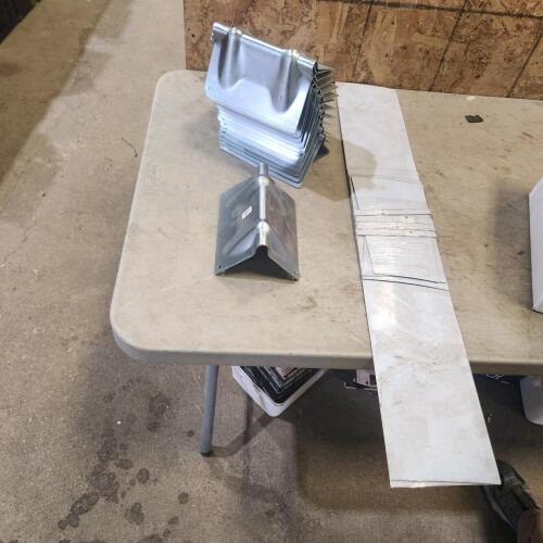 Corner pieces for tie down straps, stainless steel pieces