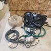 50' 1 1/2" collapsible hose, trouble light, backpack, utility pump