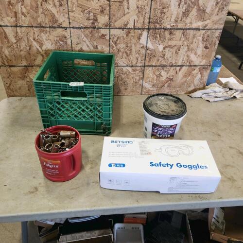 Various sockets, milk crate, safety goggles, etc.