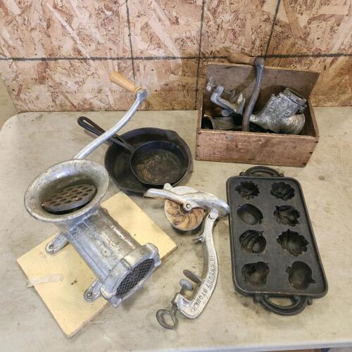 Meat grinders, cherry stoner, cast pans