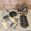 Meat grinders, cherry stoner, cast pans