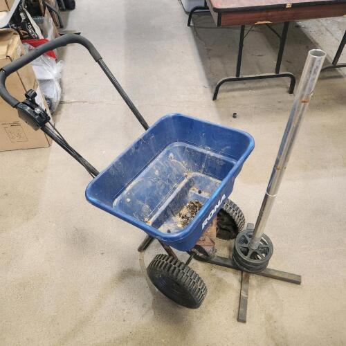 Fertilizer spreader, tire storage rack