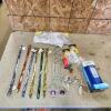 Dog collars, cow tail holders, spark plugs, mosquito repellent