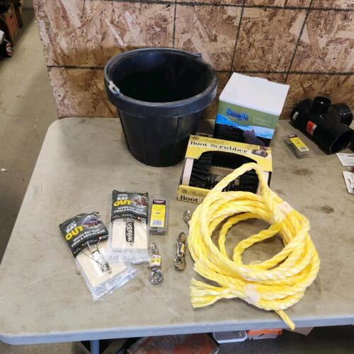 Rat traps, bucket, boot scrubber, rope, livestock water bowl