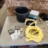 Rat traps, bucket, boot scrubber, rope, livestock water bowl