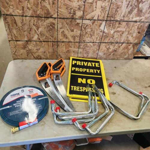 New Soaker hose, signs, saws, storage hooks