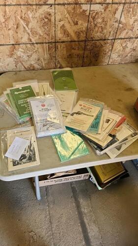 Assorted pistol, rifle, and shotgun manuals
