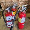 4 12" Charged fire extinguishers