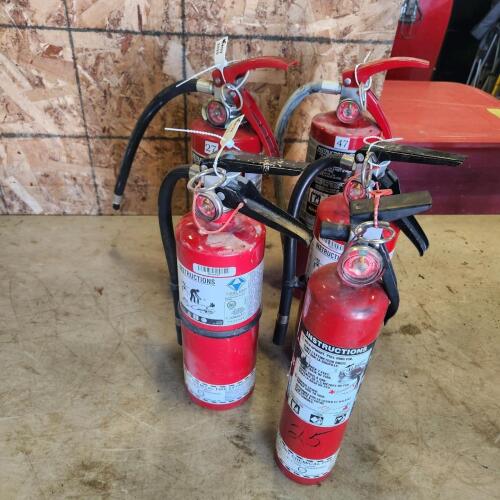 5 Various sized chargered fire extinguishers