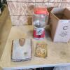 Antique scale, gum ball machine