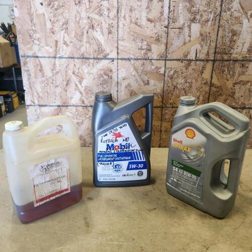 Part jugs of hydraulic oil & gear lubes