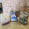 Part jugs of hydraulic oil & gear lubes