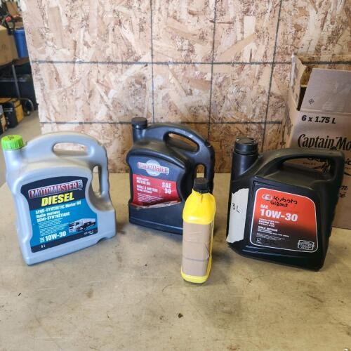 Part jugs of 10W- 30 oil