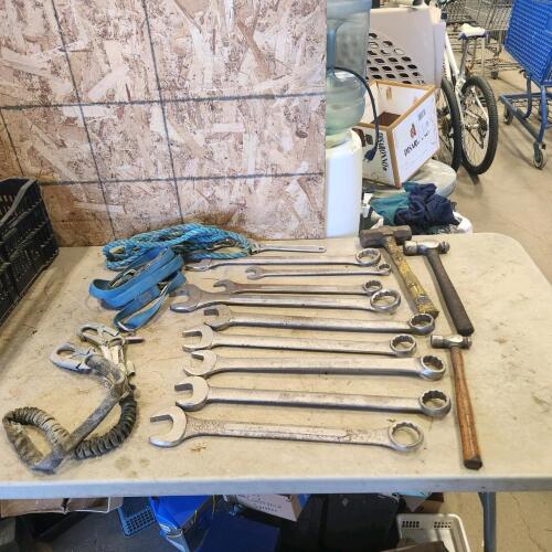 Various large wrenches, hammers, safety ropes