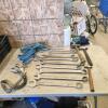Various large wrenches, hammers, safety ropes