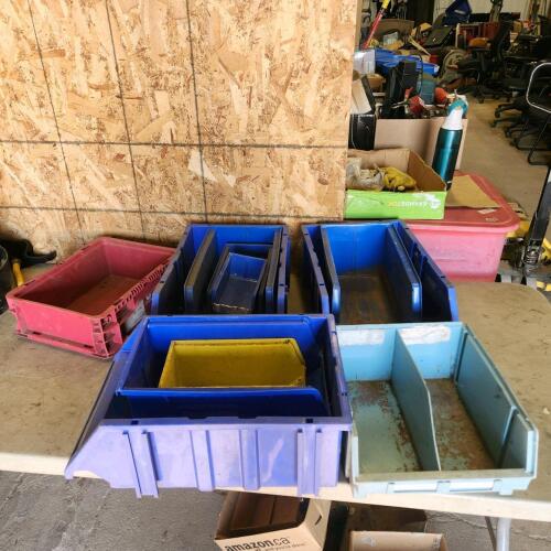 Various sized plastic bins