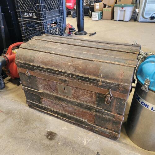 Vintage trunk full of old toy train parts