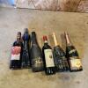 Various sealed bottles of wine