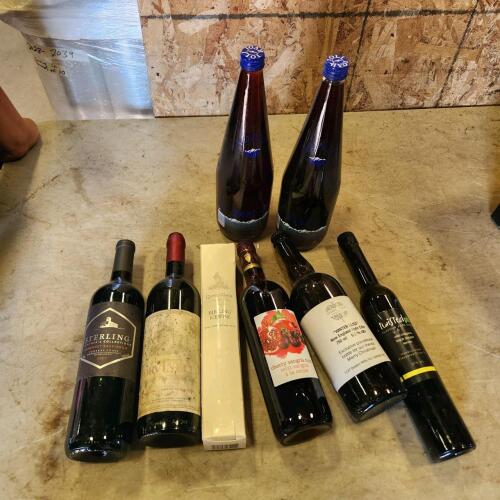 Mineral water & various sealed bottles of wine
