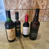 Various sealed bottles of wine