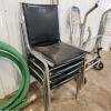 4 Leather stacking chairs