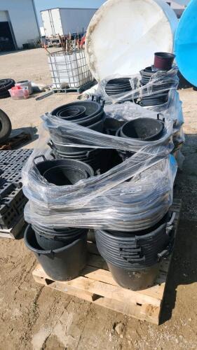 2 Skids of various size plastic planters