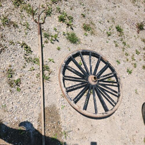 Pitch fork, wooden buggy wheel