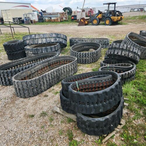 Various sized Skidsteer tracks in rough condition