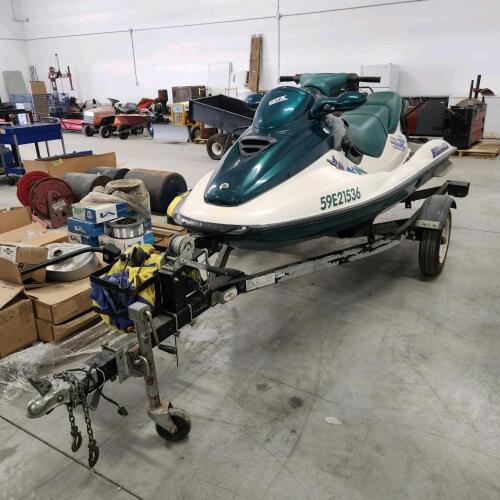 Trailer w ownership & working sea doo, comes w cover & new battery