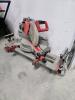 12" Milwaukee sliding mitre saw w stand