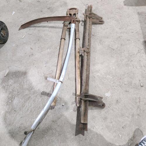 Scythe, dehorner, door track