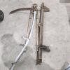 Scythe, dehorner, door track
