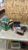 Pasta maker, cake stand, empty Magic the gathering boxes